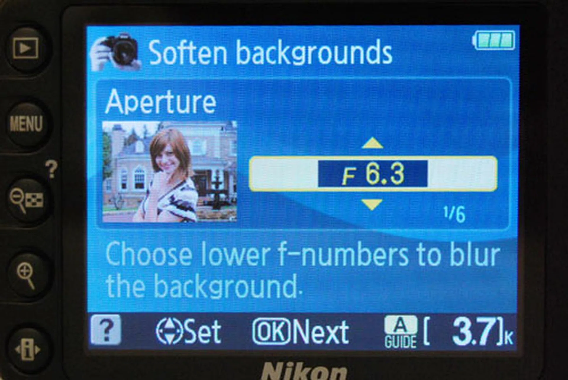 Previews use sample images to show you how different settings affect a photograph. In this instance, when you open up the aperture using a lower setting, the background behind this model softens. It's a useful way to teach new users how to manually use aperture and shutter speeds.