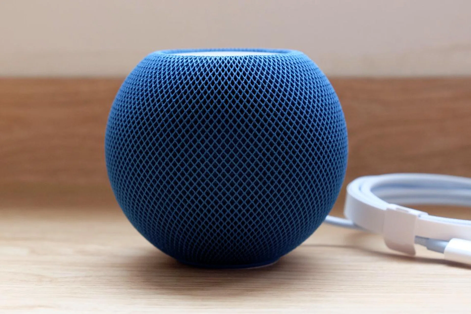 The next Apple HomePod mini and Apple TV will arrive next year with the company's own Wi-Fi and Bluetooth chip. Photo: HWZ