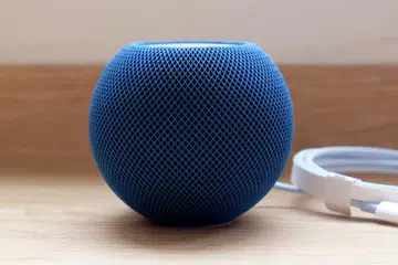 The next Apple HomePod mini and Apple TV will arrive next year with the company's own Wi-Fi and Bluetooth chip. Photo: HWZ