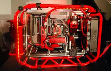The concept gaming platform at the event consisted of the Maximus VI Formula board and the Poseidon graphics card. They were both liquid-cooled and housed in what resembled a red roll cage of a stock racing car.