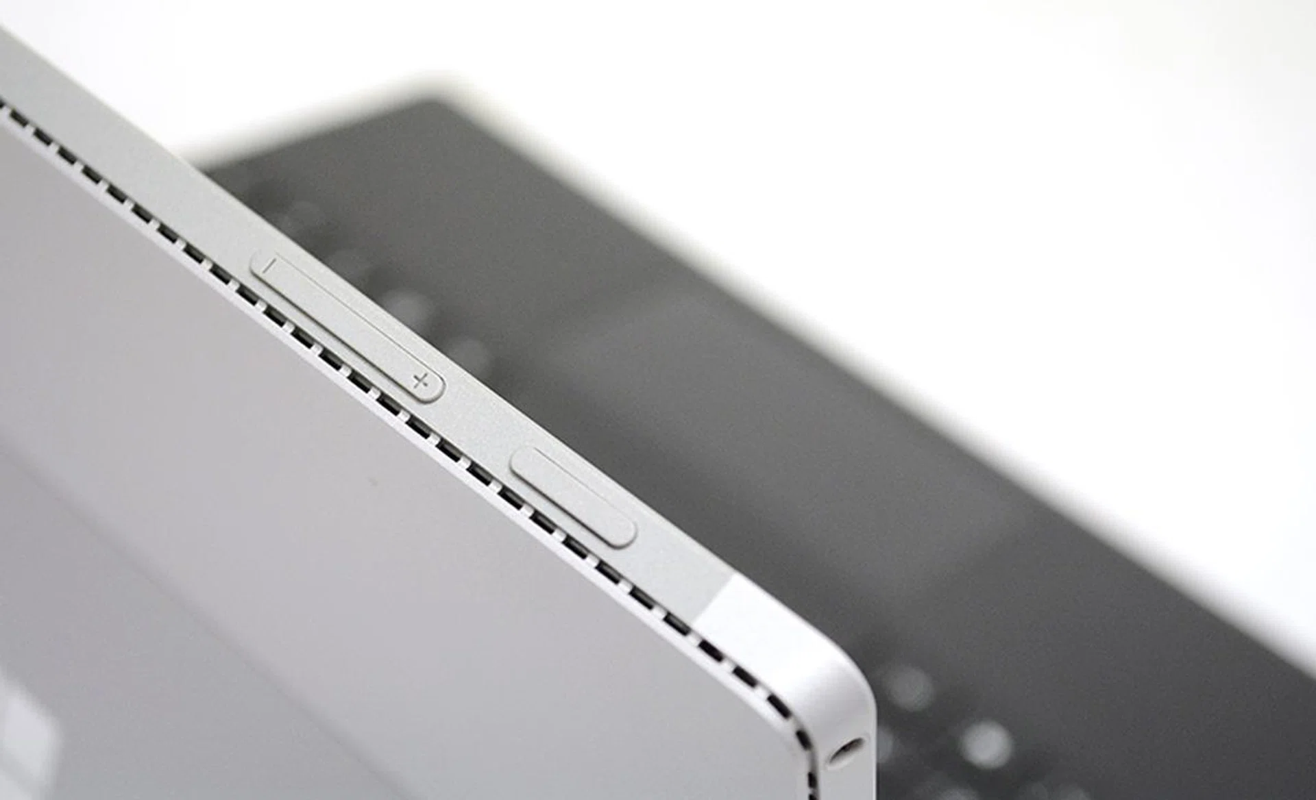 The volume rocker has been shifted to the top to sit beside the power button.