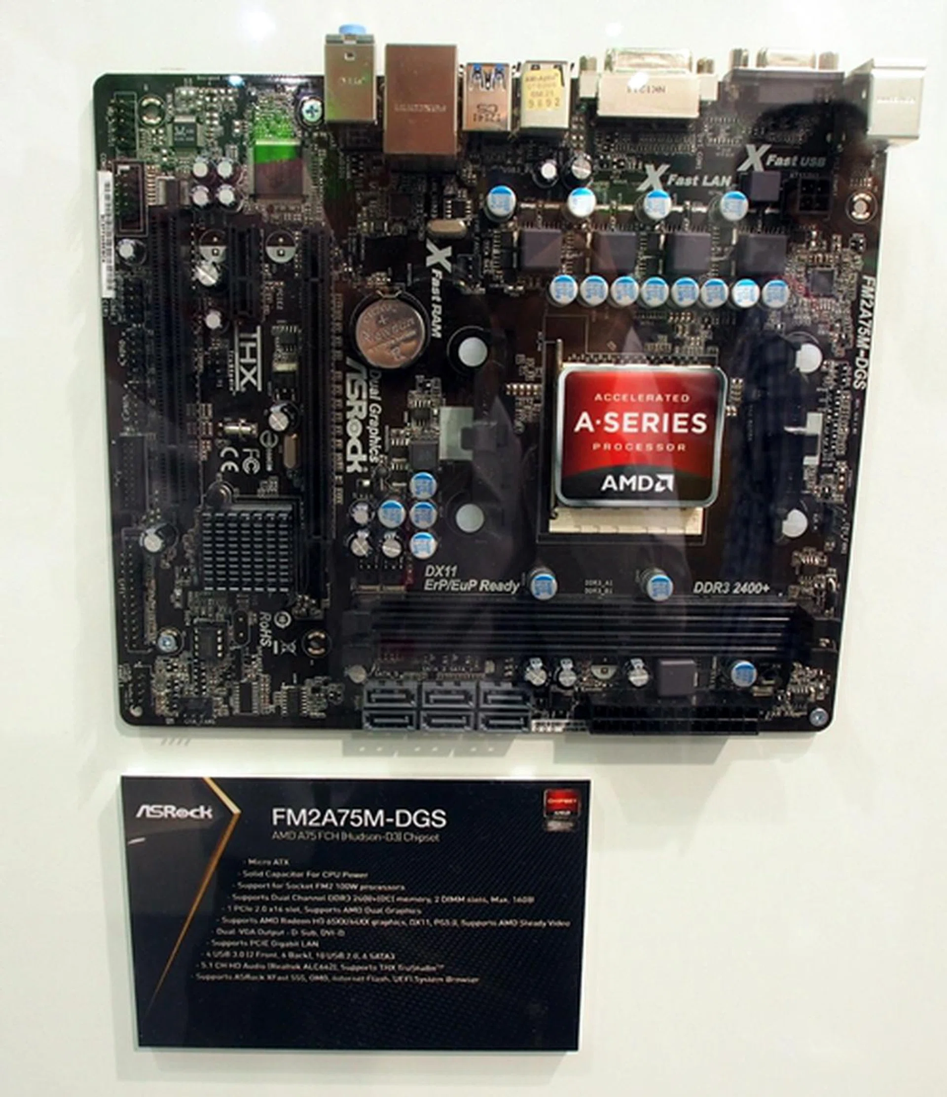 The ASRock FM2A75M-DGS is a microATX board that has only two other expansion slots besides its PCIe x16 slot. It has a pair of DIMM slots for DDR3-2400+ memory modules up to a maximum capacity of 16GB.