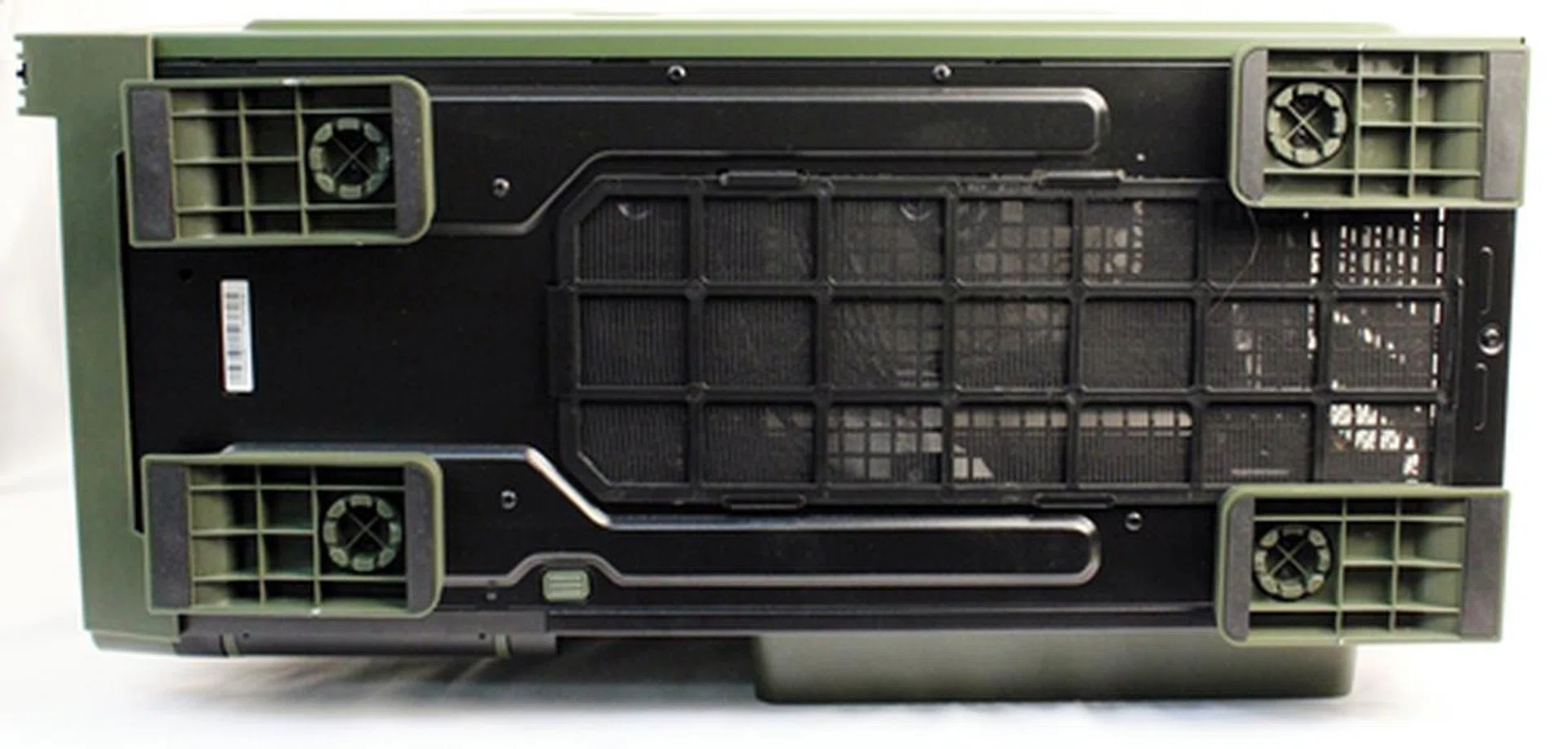 The chassis, at its side, with its four feet tucked in. If you look carefully, you may just spot the button that releases the hinged side panel door.