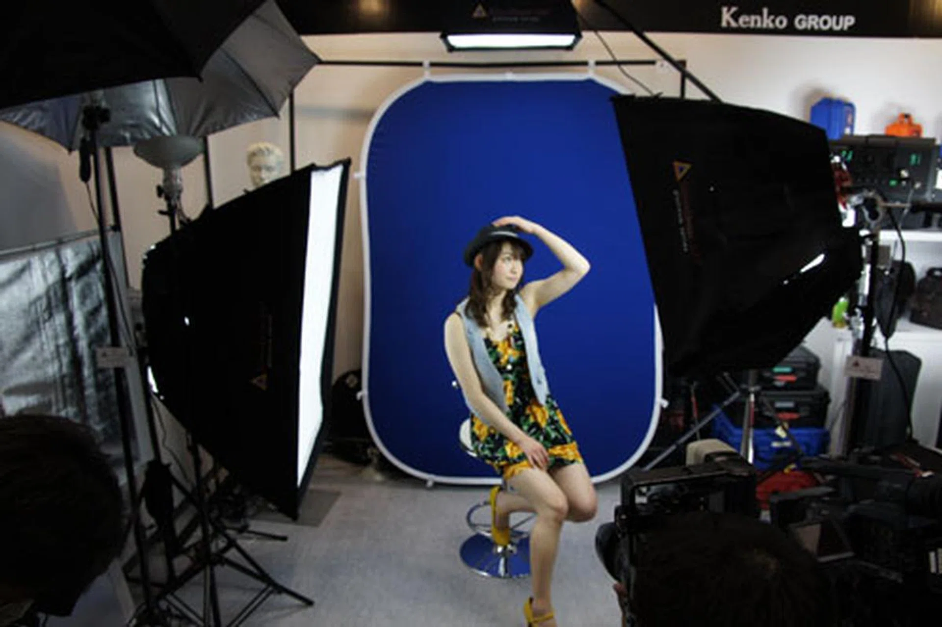 Finally, what better way to showcase your softboxes - and to seg into the booth babes section - than to have a model show them for you?