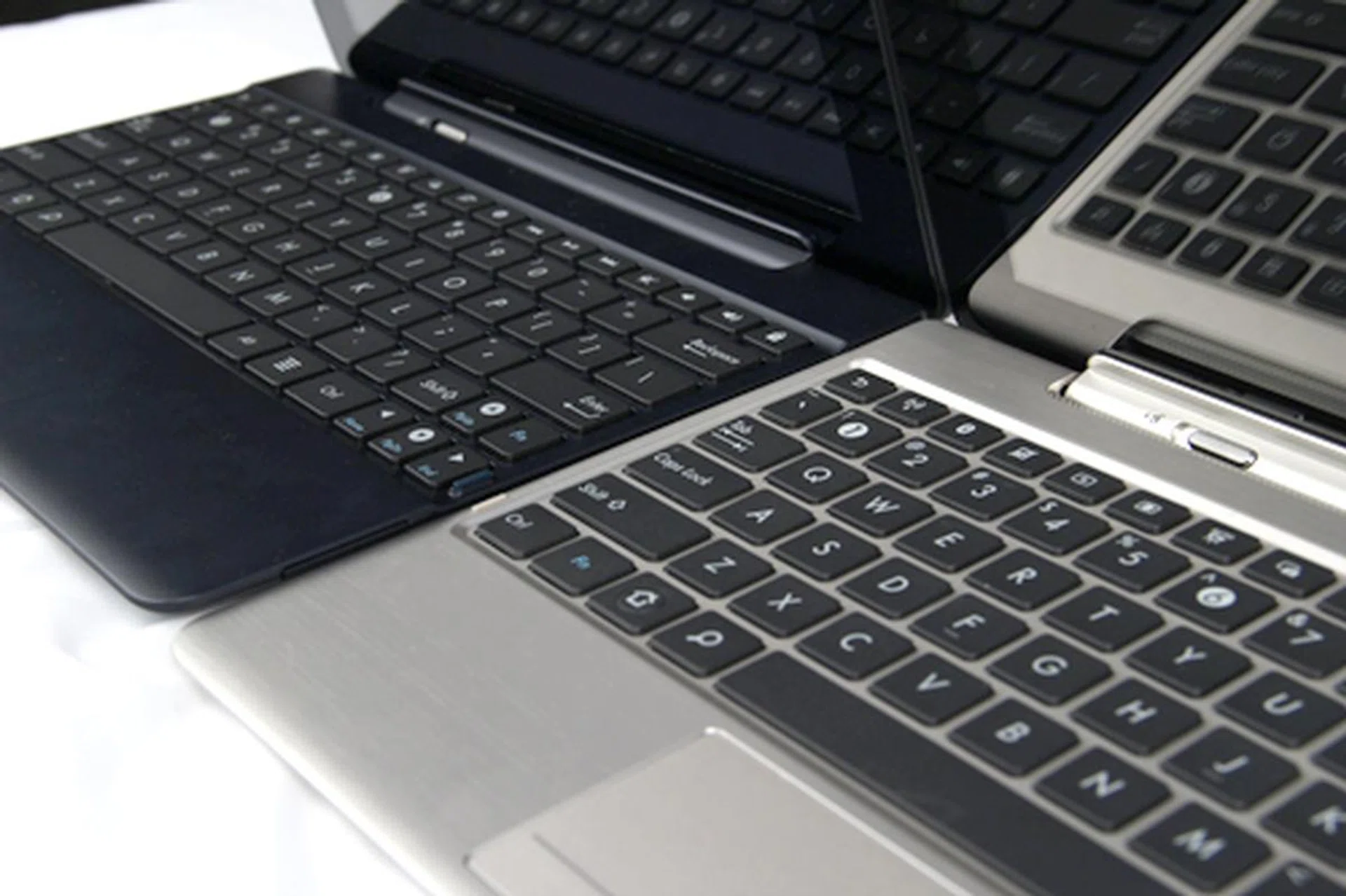 The difference in materials used between the two tablets means that the plastic keyboard has more flex than the aluminum one. But the chiclet keyboards are comfortable to type on.