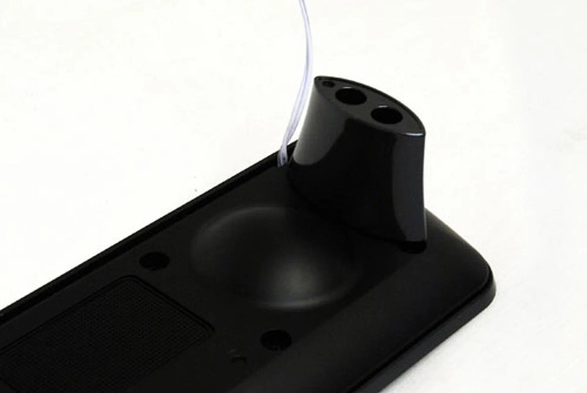 Feet on either end help keep the sound bar up. Unfortunately the unsightly wires cannot be hidden and remain a permanent eye-sore after installation.