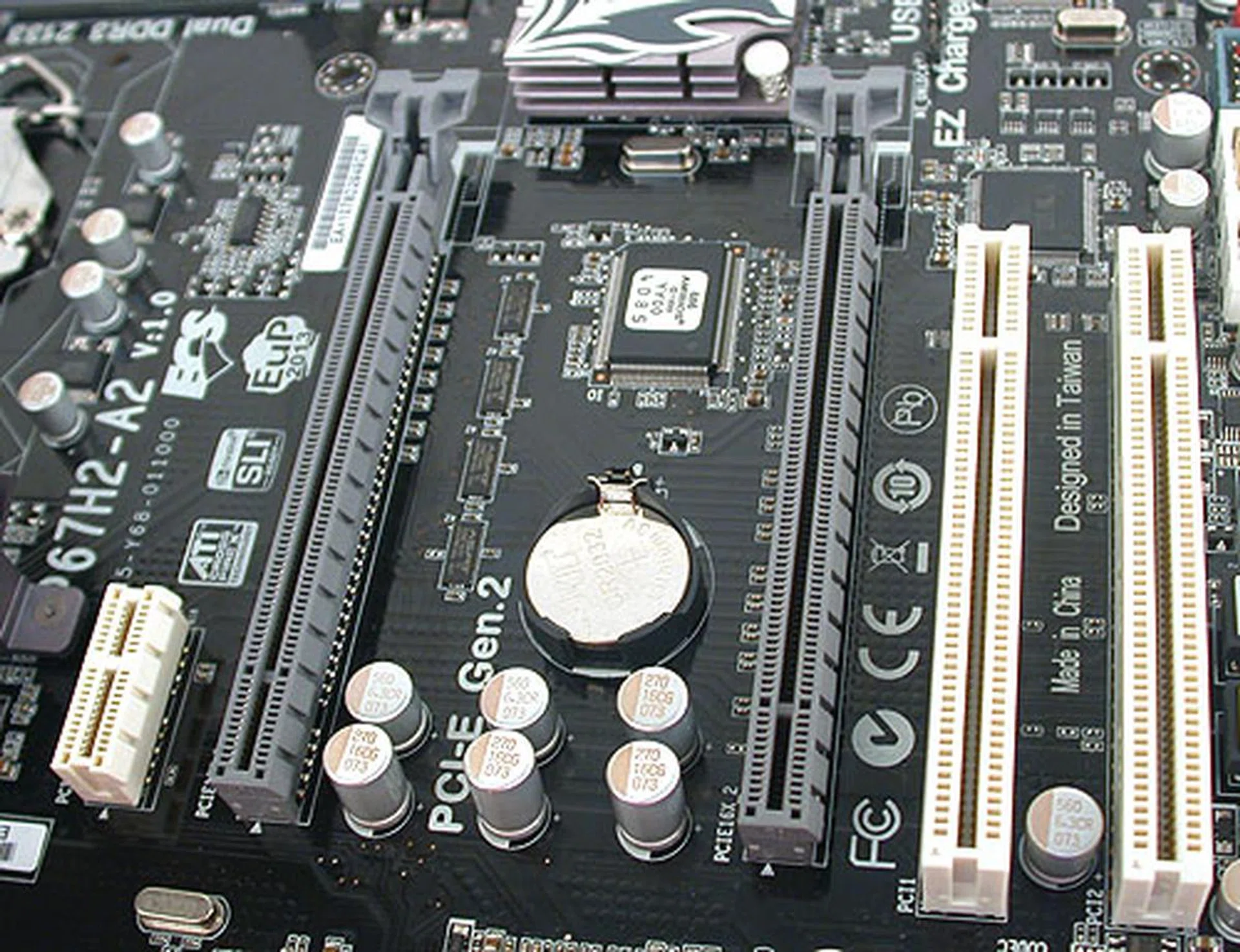 Unlike the ASUS P8P67, this ECS board has two graphics slots capable of x8/x8 when in CrossFireX mode (x16 when single). It is also certified for NVIDIA SLI, something that the ASUS cannot claim. Dual-slot graphics cards should fit right in too.