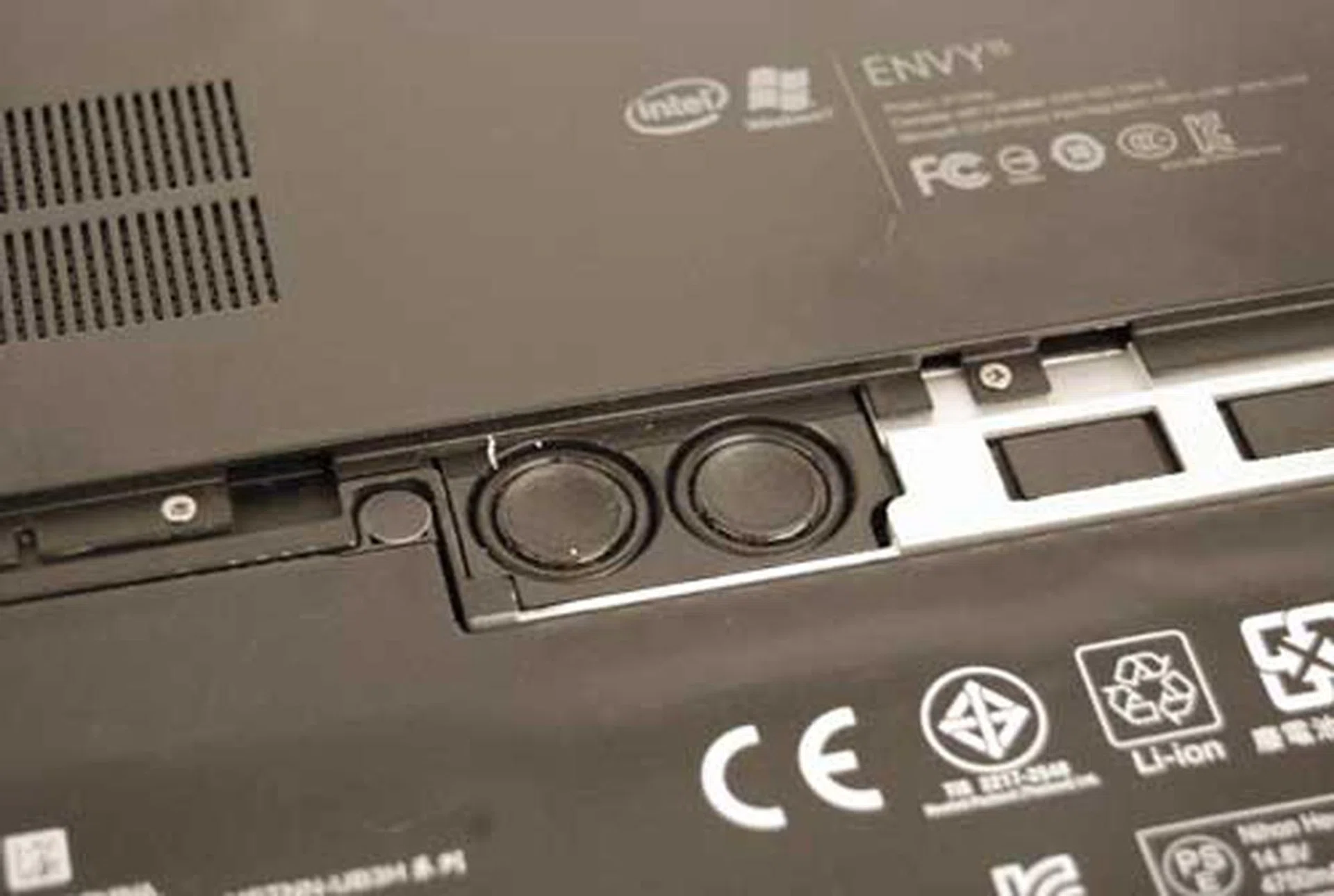 Subwoofers are found right under the battery cover. And because there are a pair of them firing down, they seem to have a bit more punch than the usual single subwoofer driver on multimedia notebooks.