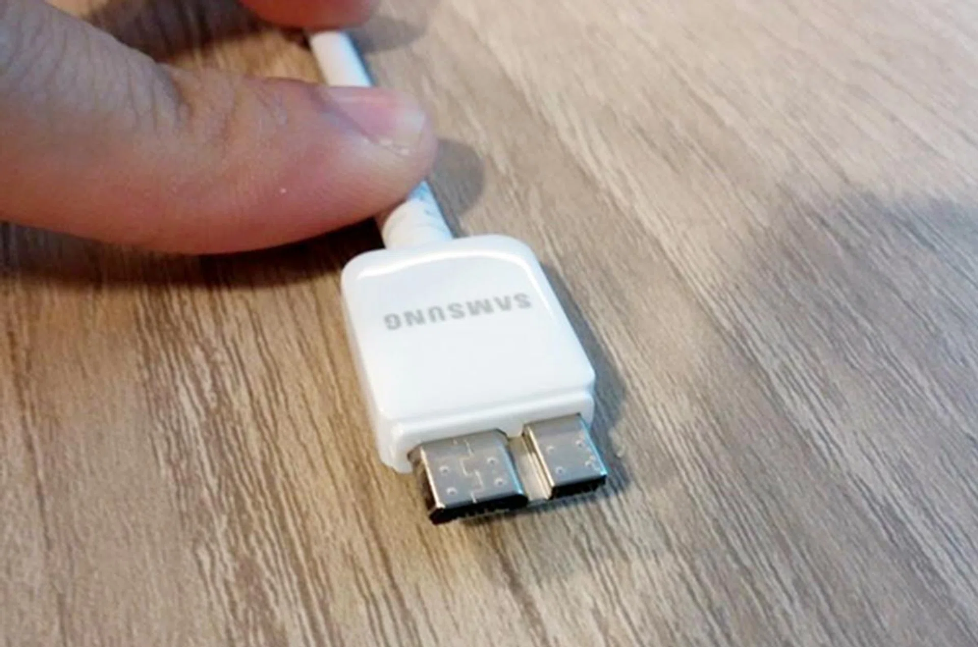 The bundled micro-USB 3.0 cable may look weird, but it has the potential to offer faster data transfer and charging speeds. Just be careful not to jam a micro-USB 2.0 connector into the wrong section of the micro-USB 3.0 port on the phone, like we did a couple of times.