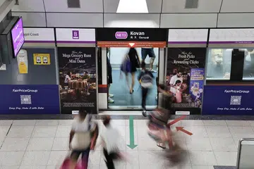 Image of people in the MRT Station