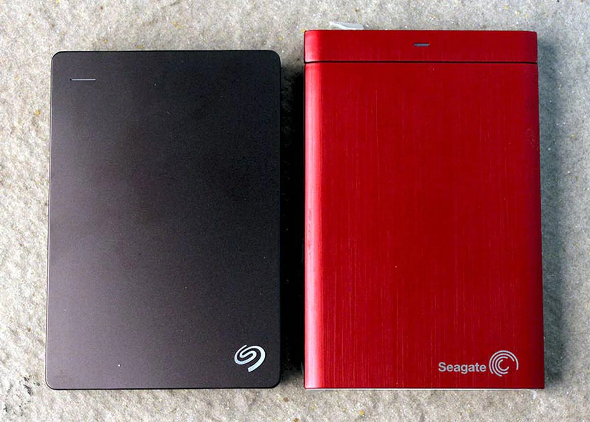The Seagate Backup Plus 4TB next to the older Seagate Backup Plus with the Universal Storage Module. You can see that the new 4TB drive is actually pretty compact.