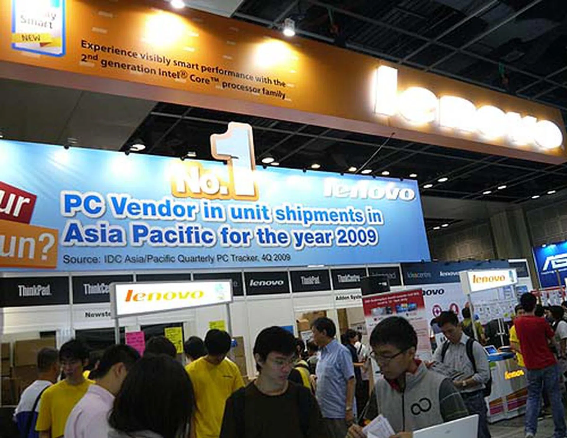 Lenovo's orange booth beckons to the youth in our hearts, and we headed over to see what they have up their sleeve.