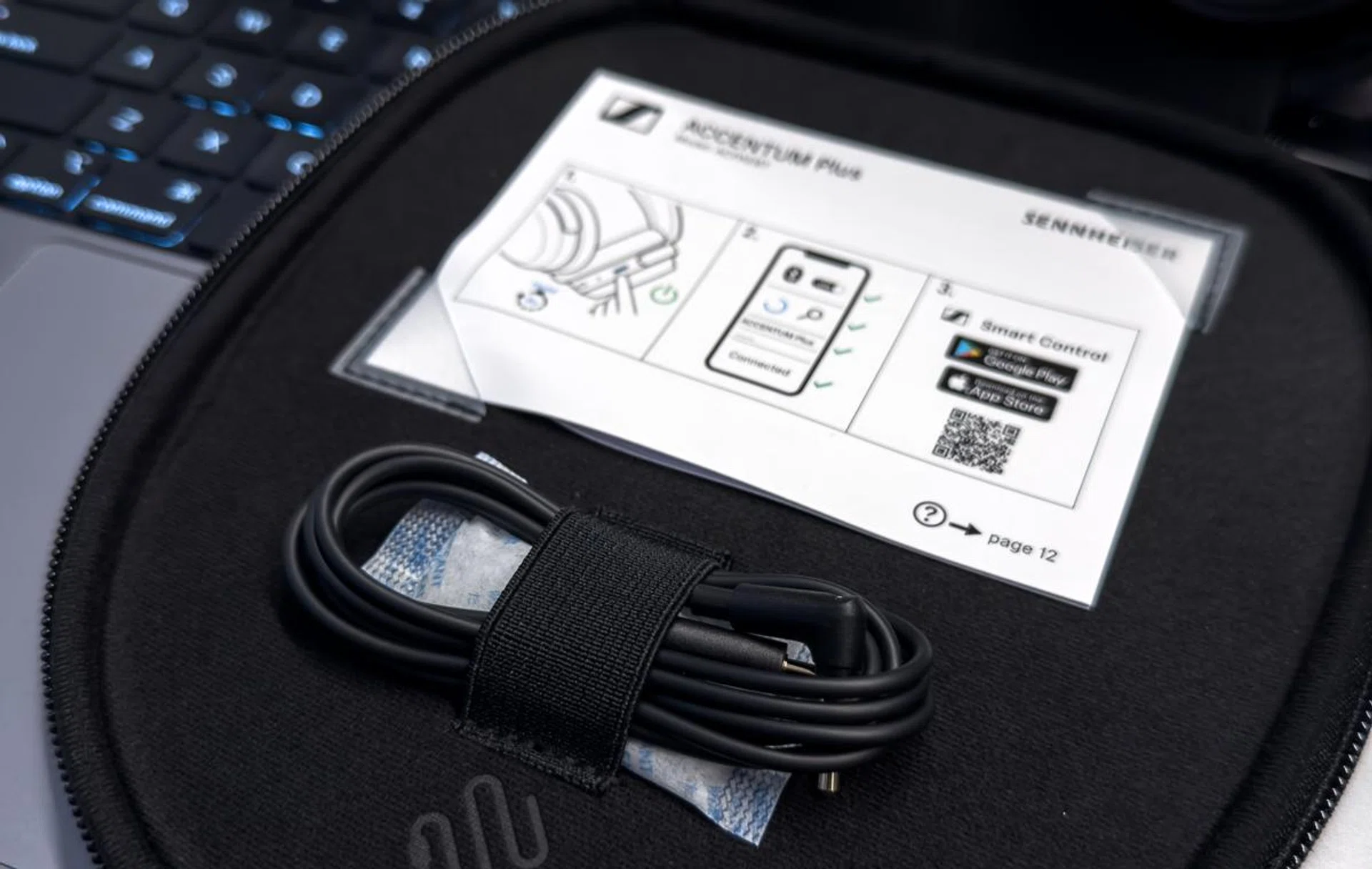 The headphones come with a charging cable and another cable for wired listening.
