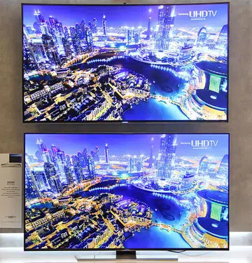 To get the curved HU9000 (above) or the flat HU8500 (below), that's the question today.