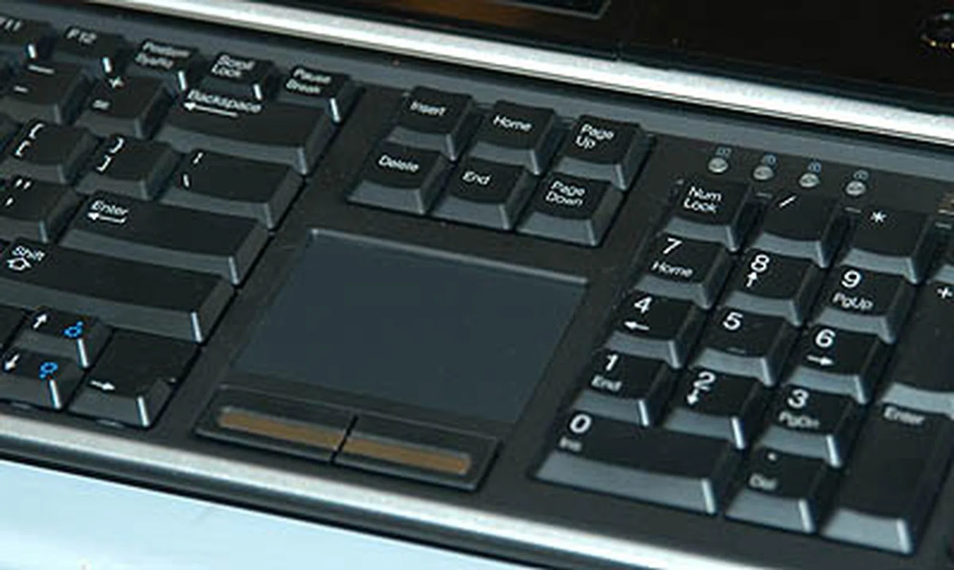 The keyboard has an integrated track pad, so you don't require a mouse when the keyboard is wirelessly operated. Smart move.