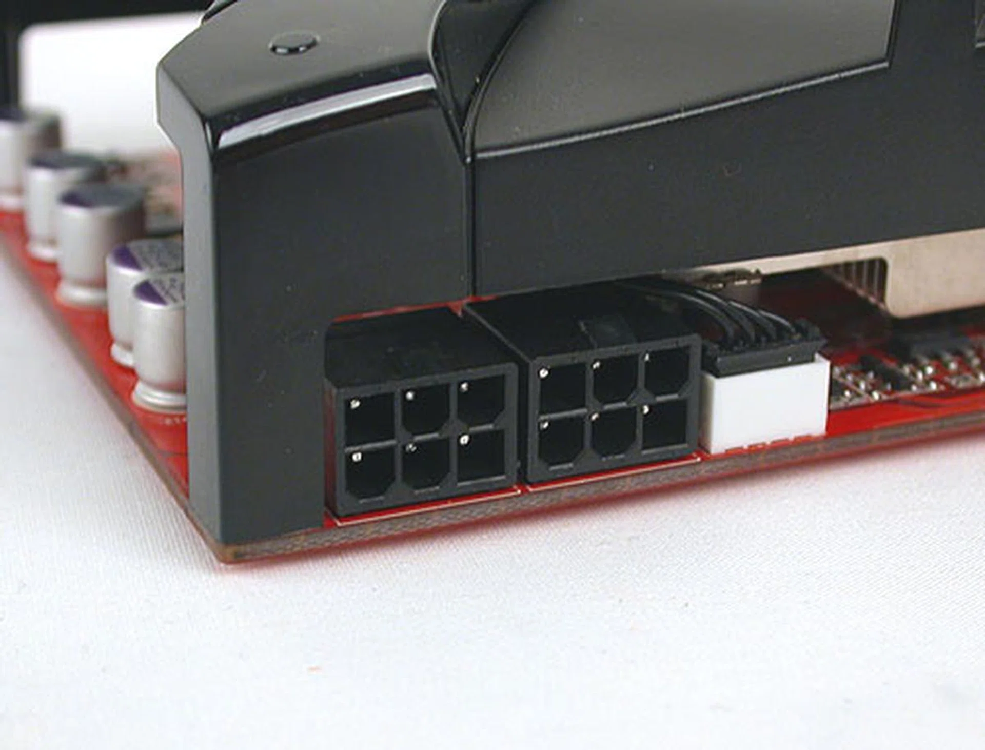 The two 6-pin power connectors on the Palit are aligned facing the top. 