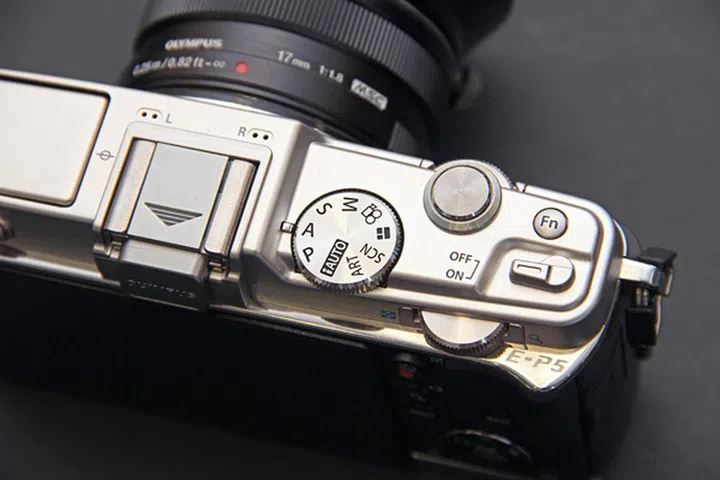The E-P5 comes with twin control dials instead of just one. The Power switch has also been redesigned,