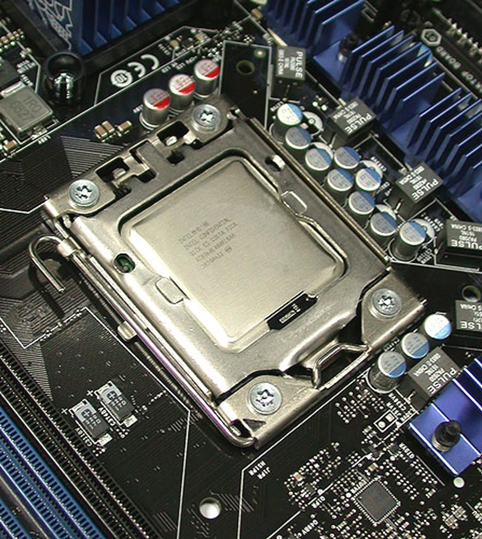 The actual Extreme Edition Core i7-965 chip that we received from Intel, already installed in its new socket on the reference X58 board. 