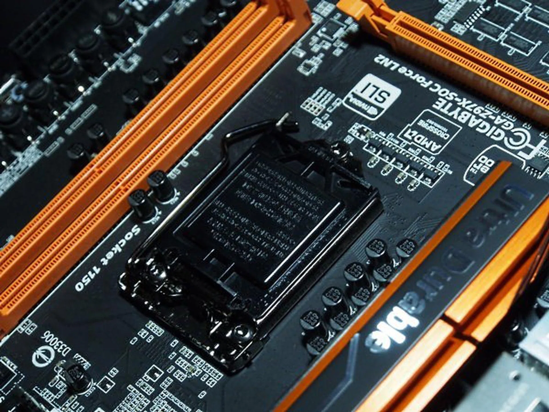 Notice that the board only has 2 DIMM slots, which are purposely located much closer to the CPU socket to improve latency performance. Because of this, there are no heatsink bracket holes around the CPU socket either.