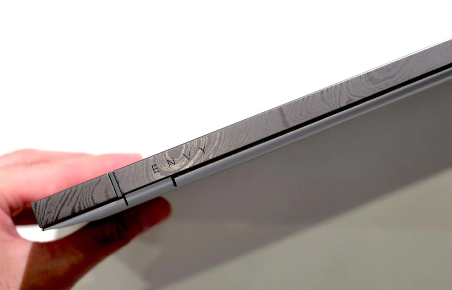 Note the Damascus steel print on the hinge of the Envy 13.