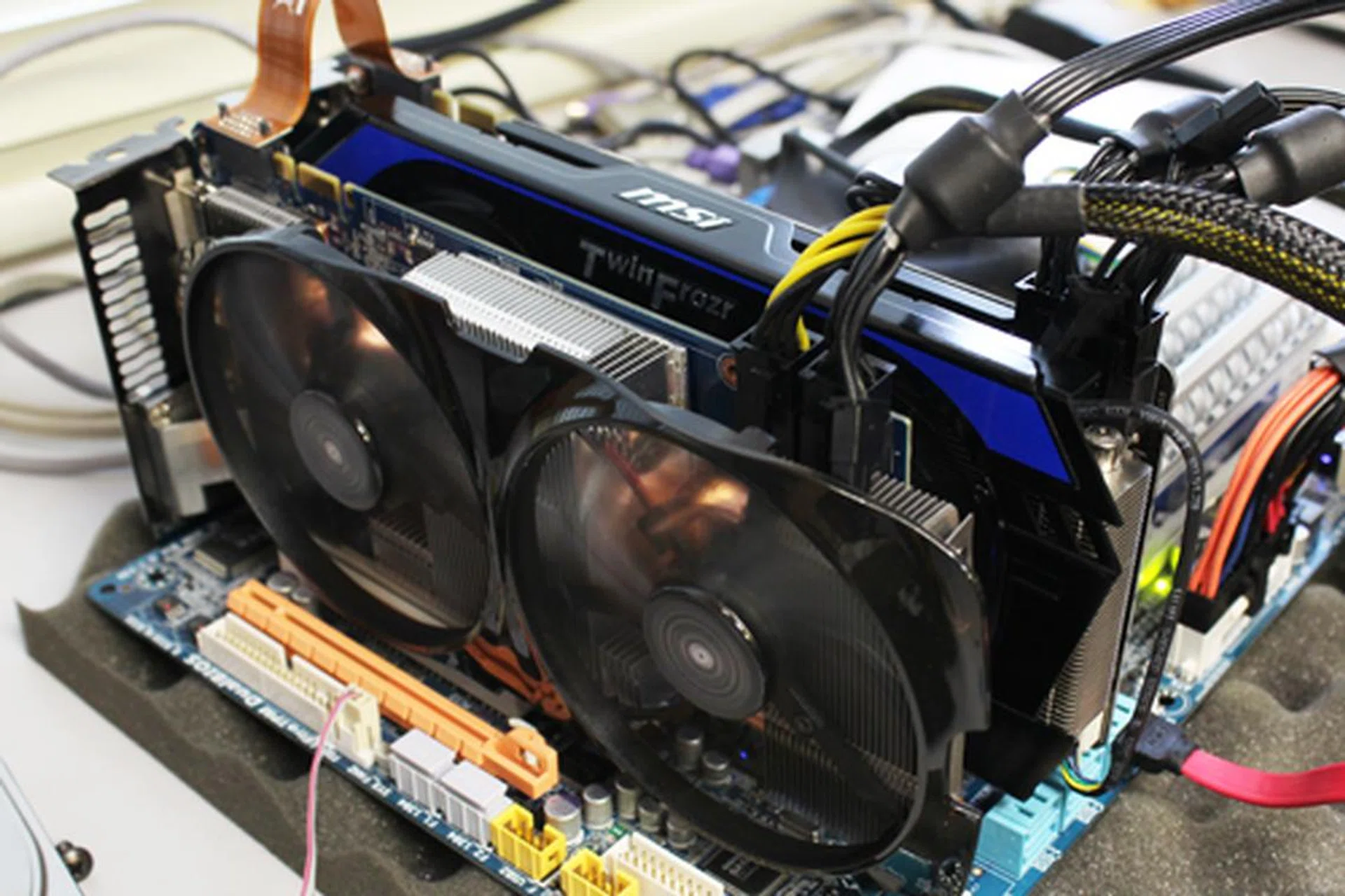 We've downclocked our MSI and Gigabyte custom models to reference specs to give you a baseline indication of how the GTX 660 Ti will perform in 2-way SLI configuration. 
