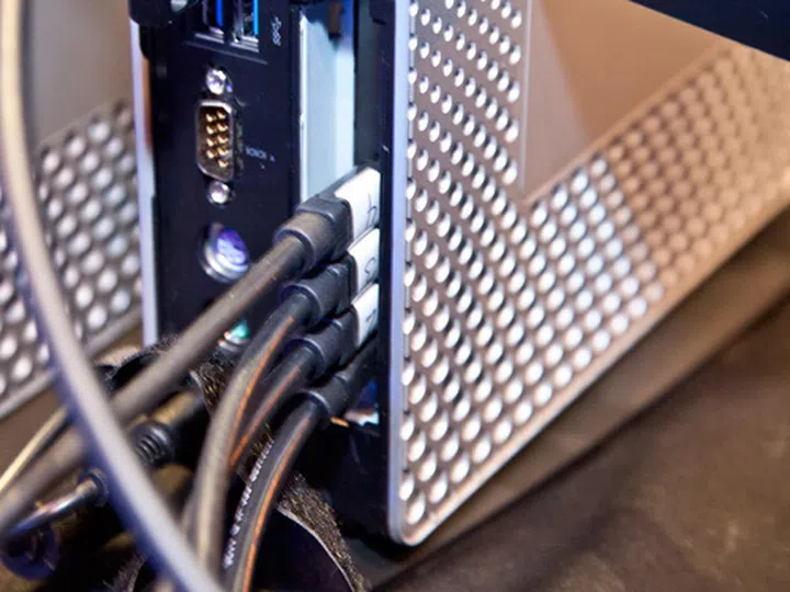 By adding another Radeon-class graphics card, the HP t610 can display to as many as six monitors using two of its built-in graphics ports along with four of the ports from the graphics card.