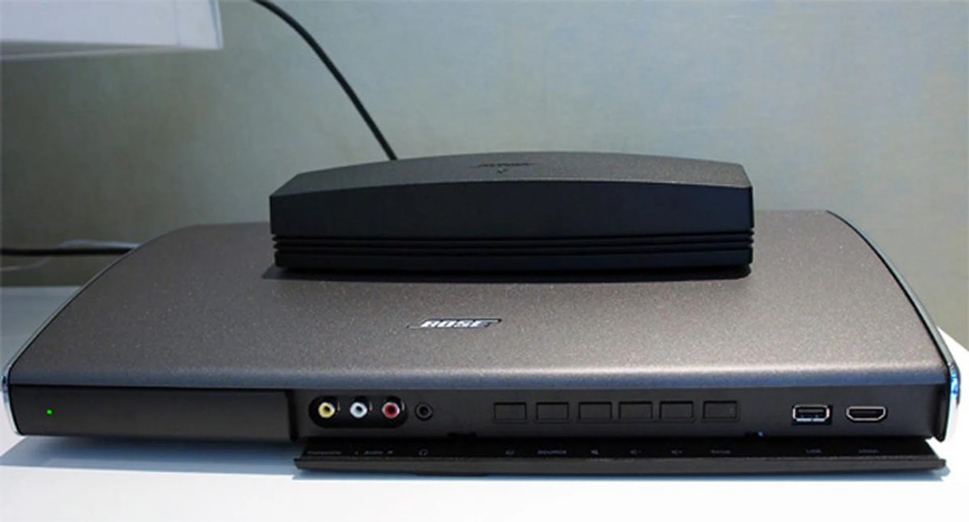 The nondescript box on top is the SoundTouch Wireless Adapter, which connects to your Bose Lifestyle series system to the other SoundTouch systems in your home.