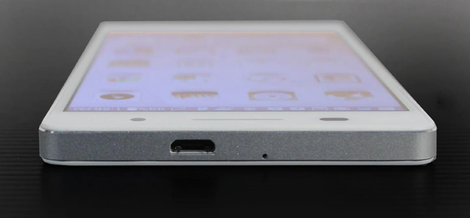 This may look like it should be the bottom of the phone but it's not. The P6's micro-USB port is right at the top of the phone (and off center) and certainly spoils the aesthetic.