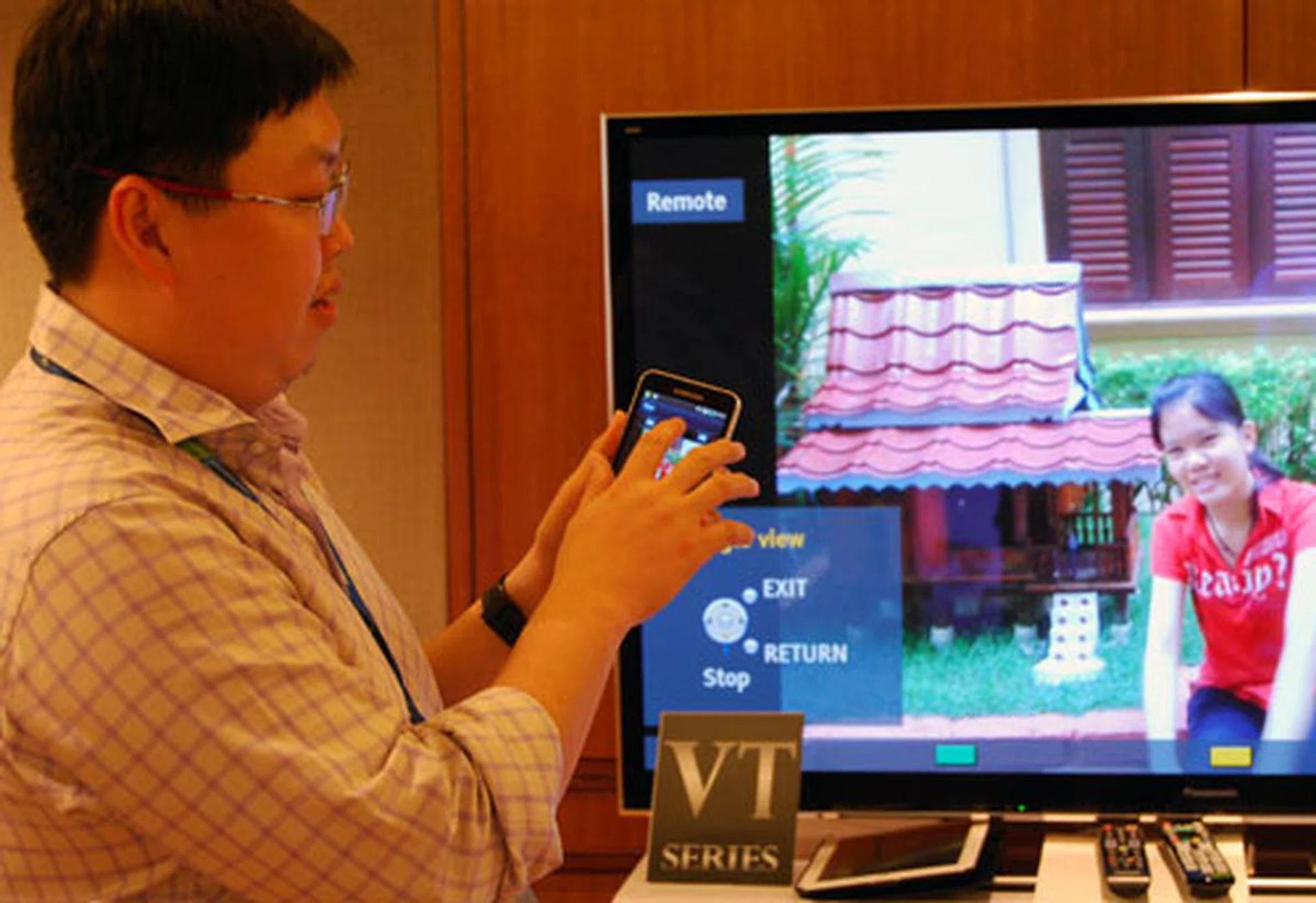 Panasonic spokesman, Will Yu, demonstrating the finer aspects of the improved Viera Remote app which transforms your smartphone or tablet into a touch-based remote with tap-and-flick features.  