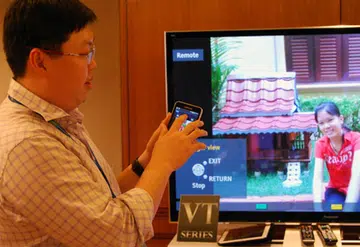 Panasonic spokesman, Will Yu, demonstrating the finer aspects of the improved Viera Remote app which transforms your smartphone or tablet into a touch-based remote with tap-and-flick features.  