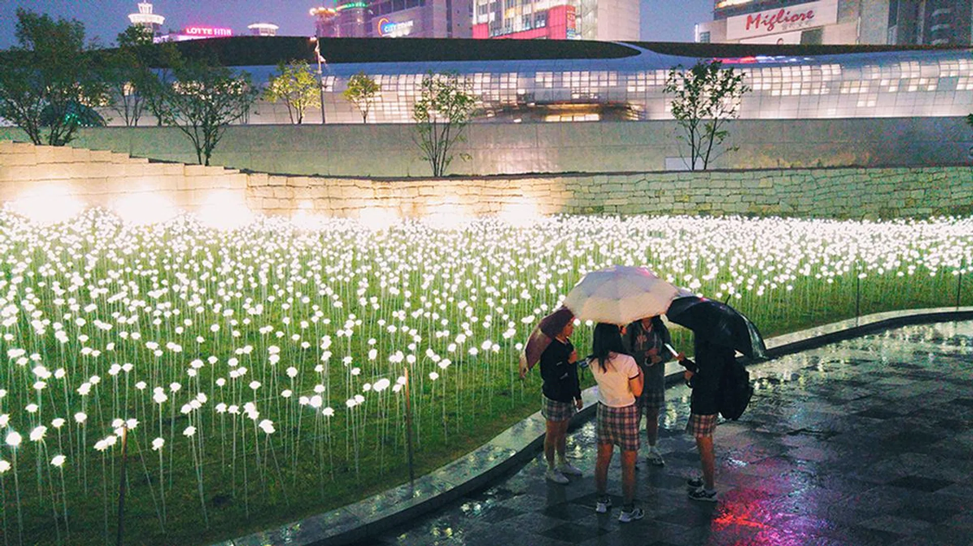 Raining outside DDP, 28mm at f/1.8, 1/17 sec, ISO 800.
