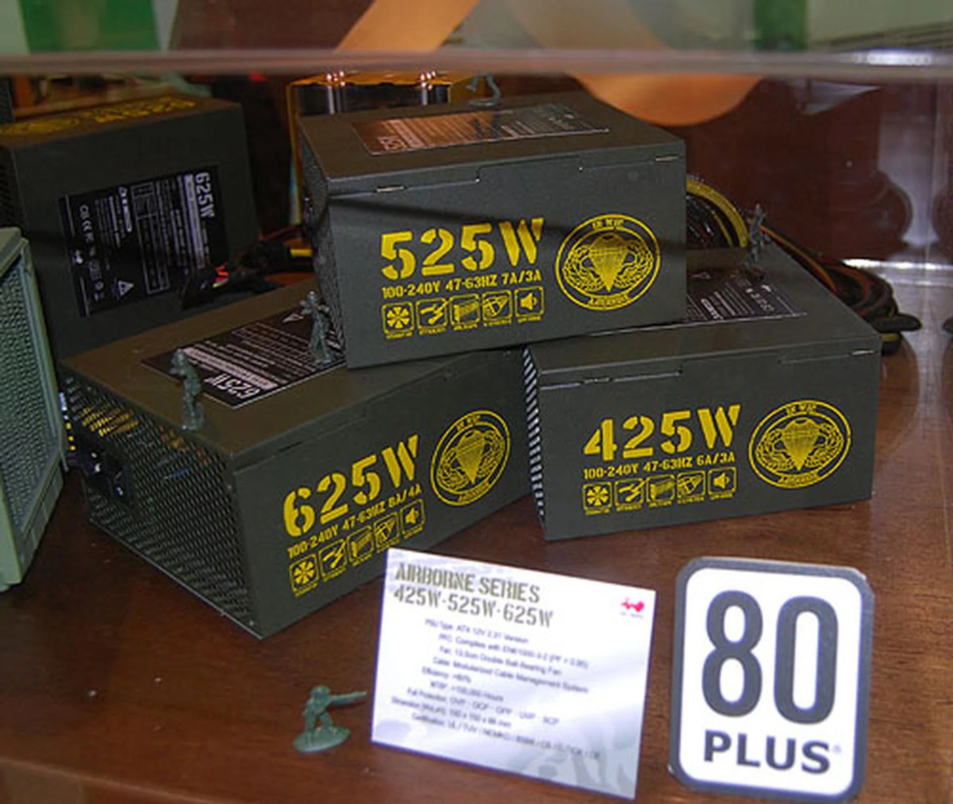  If you're going the whole military dress up theme, why not consider these Airborne PSUs. Beneath the military markings, you'll find decent, modular cable PSUs that are 80 PLUS certified.  