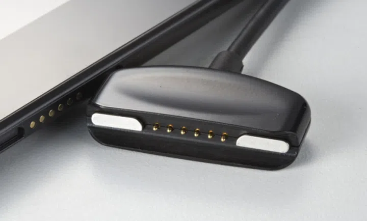 An example of pogo pin technology. In this case, being used as a charger.