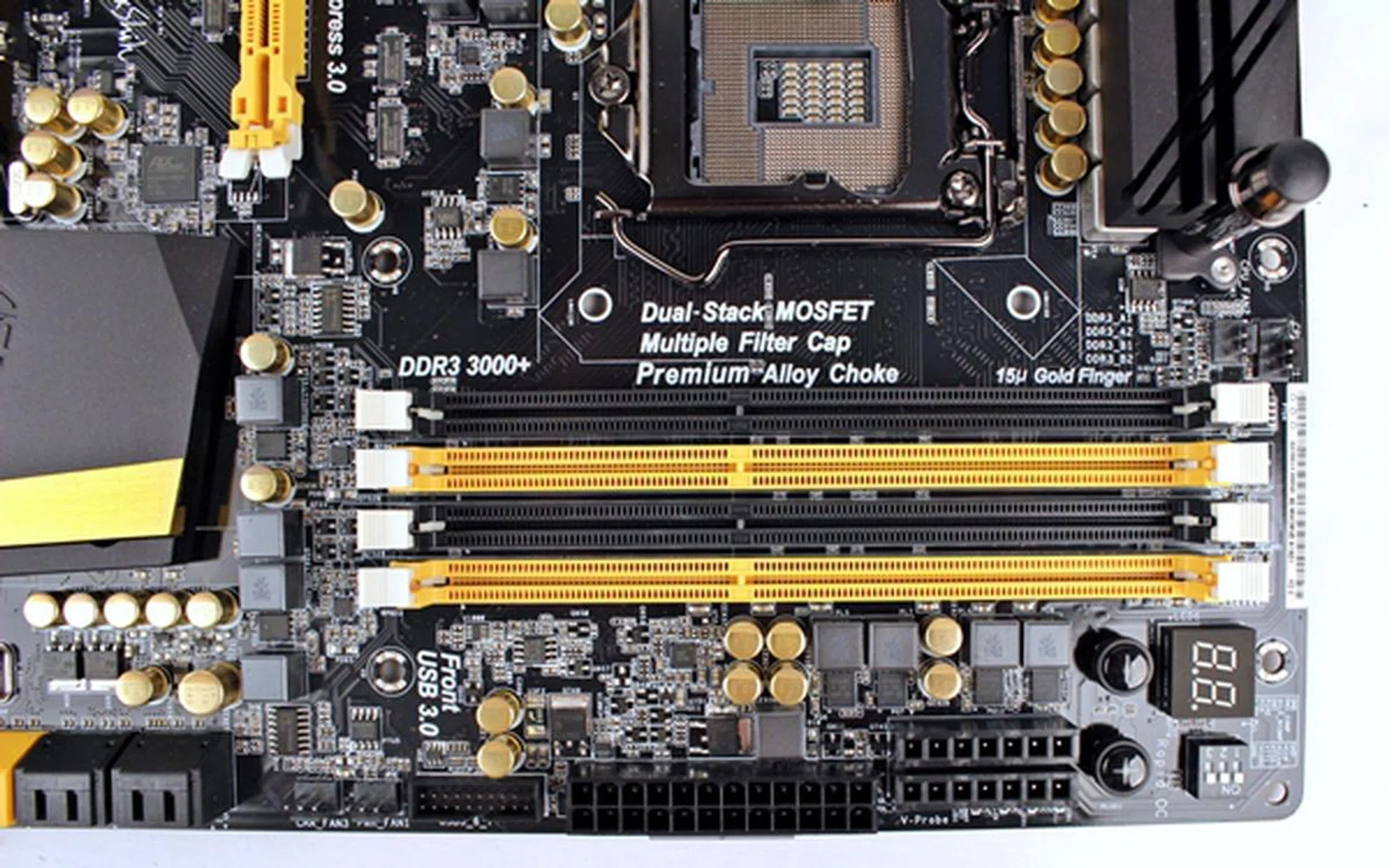 Located just beyond the DIMM slots, there are a number of high-end features targeted at power users; the PCIe DIP switch, Rapid OC buttons and V-Probe.