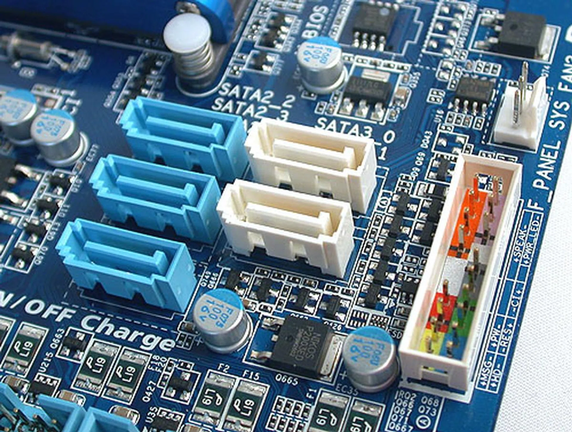 The SATA ports may point to the sky but they aren't in the way of the longer graphics cards, unless you happen to have an equally long expansion card for the PCI slots. No onboard power or reset buttons for this class of boards.