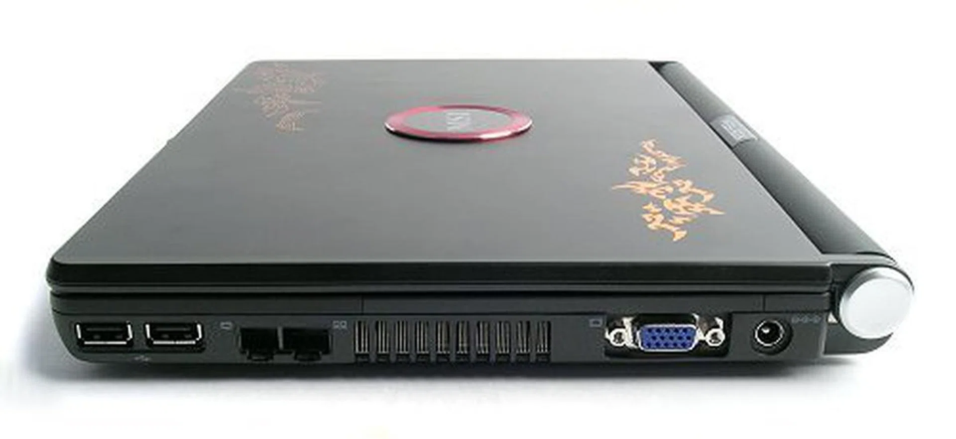 Right Face – (left to right: 2 x USB 2.0 ports, RJ-11 modem phone jack, RJ-45 Ethernet jack, Analog RGB port, Power jack.)
