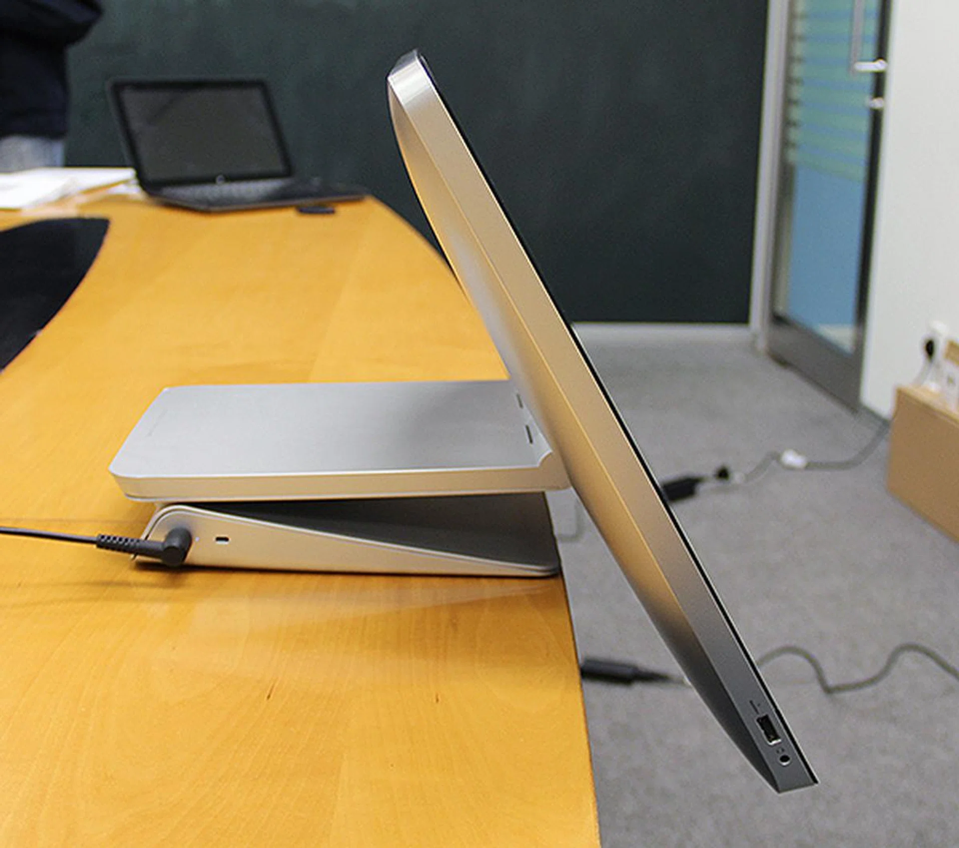 If you place it at the edge of the table and adjust it accordingly, you can forgo your keyboard and mouse and just use the touchscreen display for input.