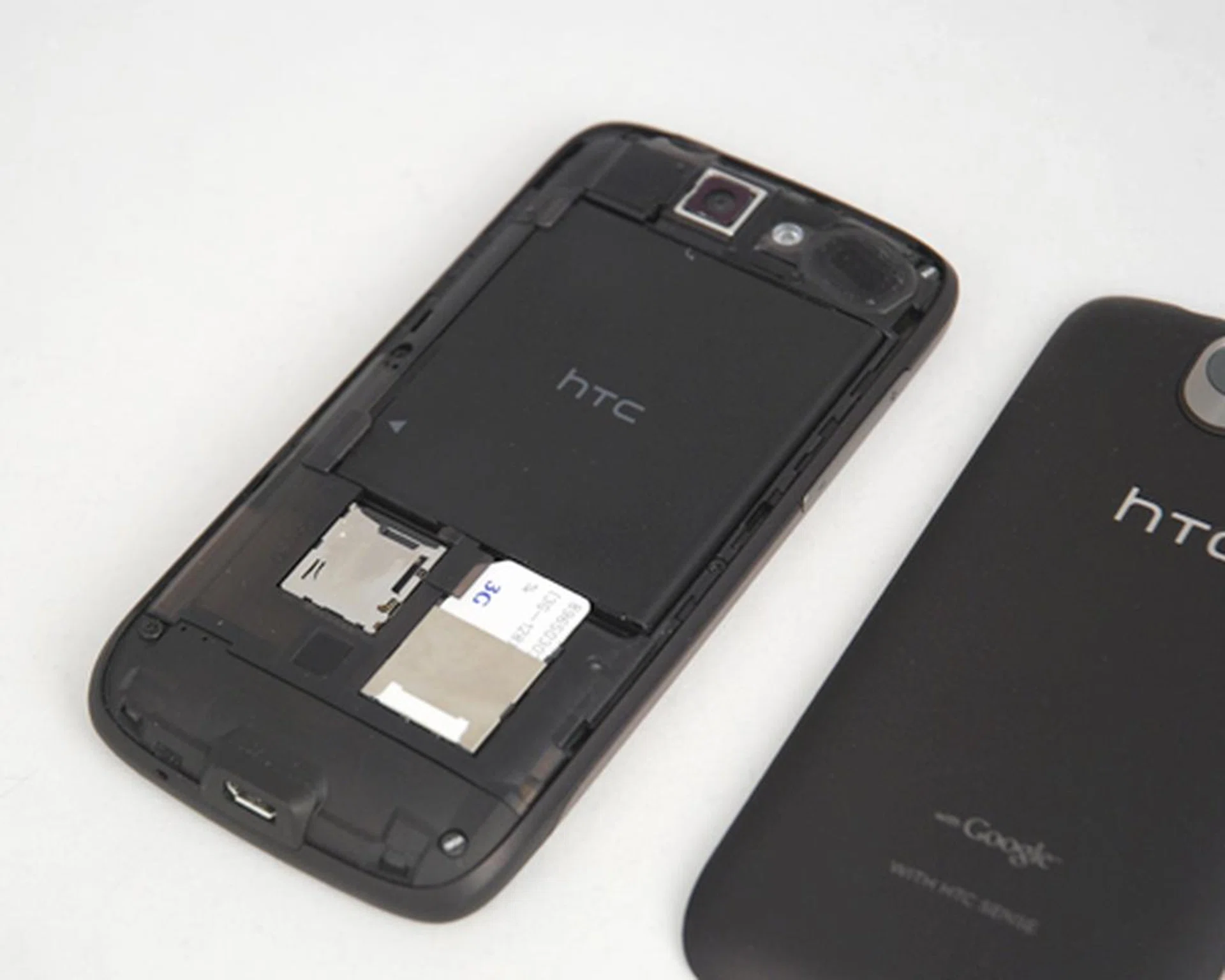 Pry, open and access the battery, microSD and SIM card behind the device.