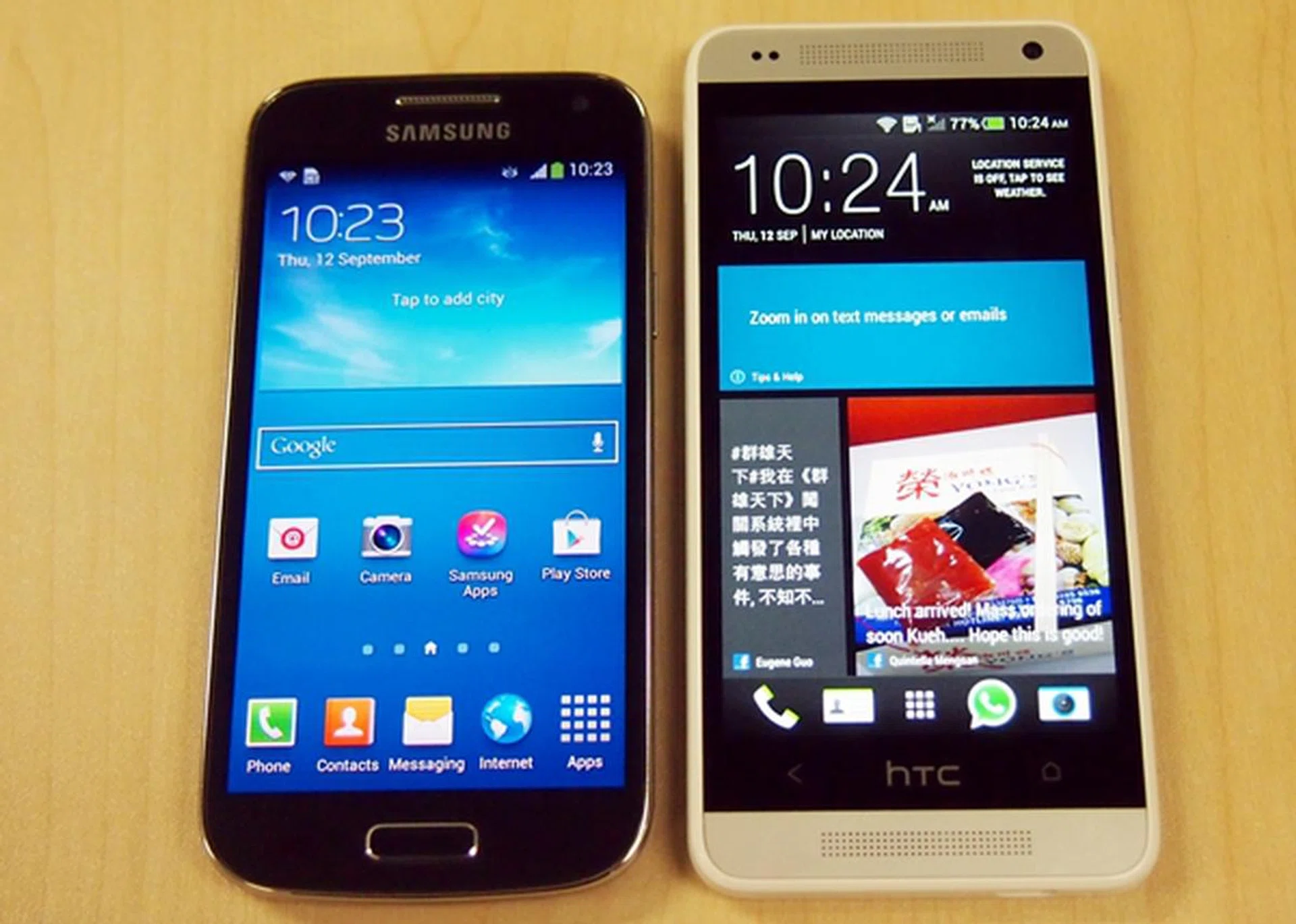The HTC One mini (right) is slightly longer, wider, thicker and heavier than its arch rival, the Samsung Galaxy S4 mini (left).