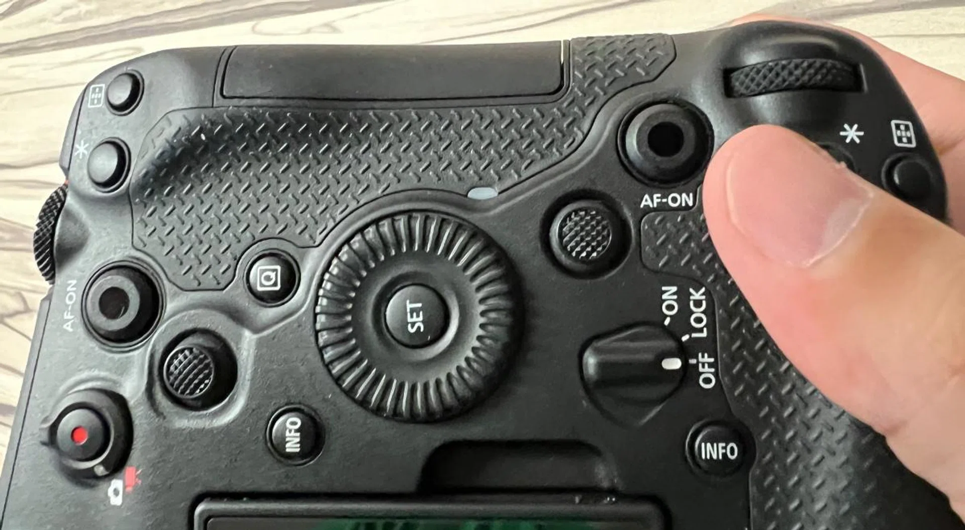 The button layout looks confusing but makes the EOS R1 comfortable to shoot whether in landscape or portrait. Photo: HWZ