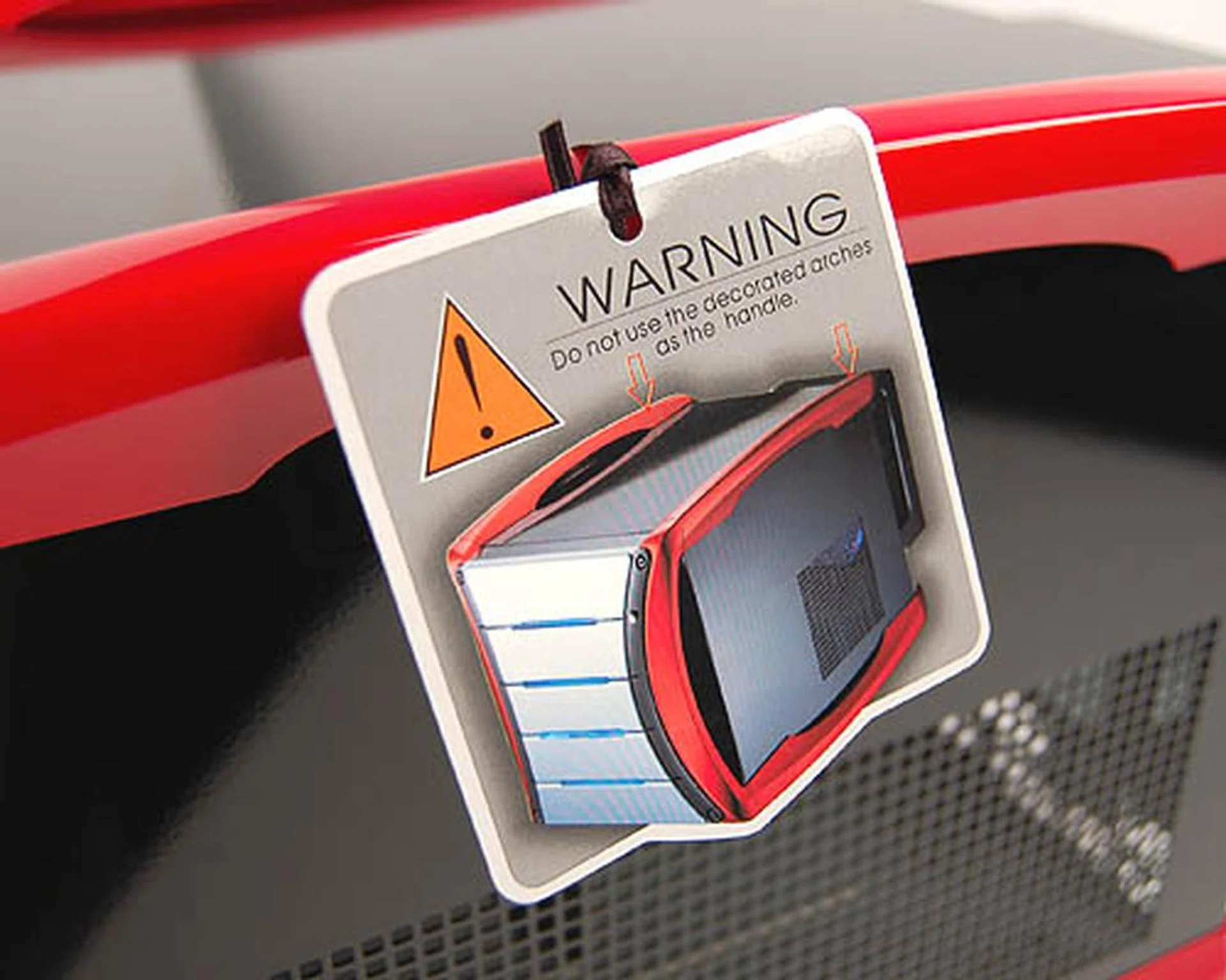 AOpen warns users against carrying the G325 by the red arches. Don't say you weren't warned. 