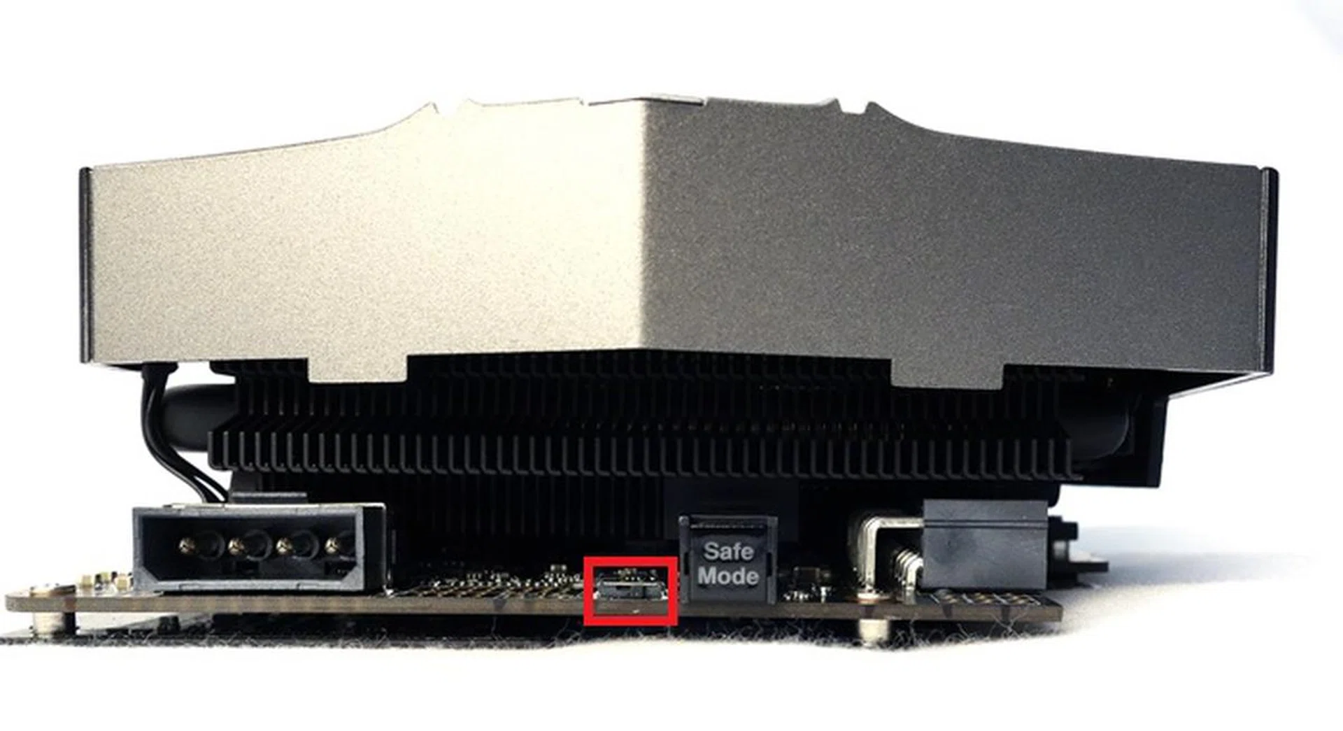 There's a LN2 dip switch that is located next to the Safe Mode button. The Molex power connector is used to provide extra juice so that the dip switch can be used during sub-zero cooling for extreme overclocking. 