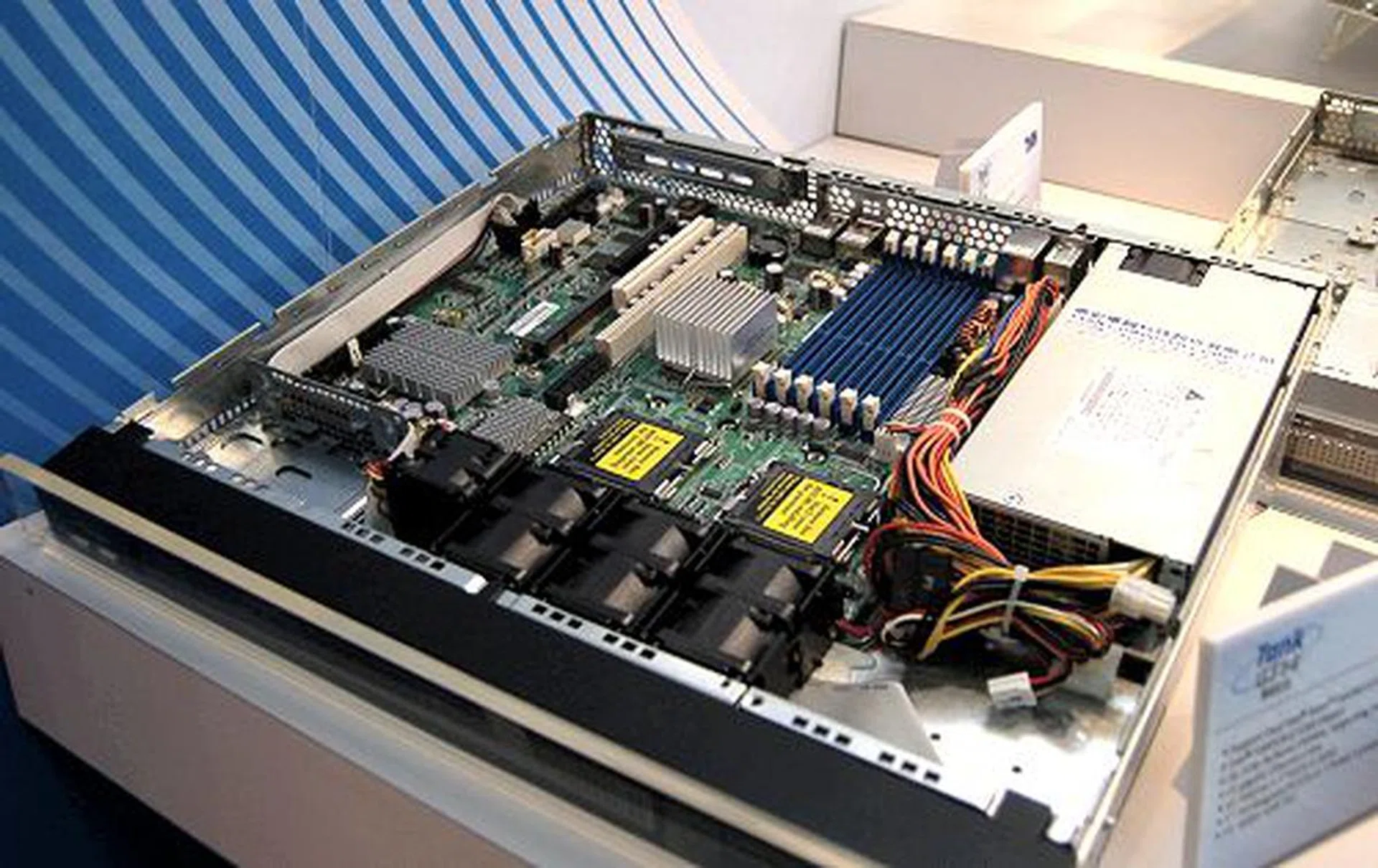  For high density compute power, without sacrificing rack space, Tyan has a couple of new sub-1U sized racks. In fact, two of these can fit into the space of a normal 1U chassis. This particular model is the Tank GT14 barebones server chassis utilizing an Intel 5000V platform, has six FBDIMM slots capable of supporting up to 24GB of memory, dual Gigabit LAN ports, space to house dual 2.5-inch SATA 3Gbps drives and can accommodate either one PCIe x16 expansion card or one 133MHz PCI-X slot. Comes with a 400W PSU.  