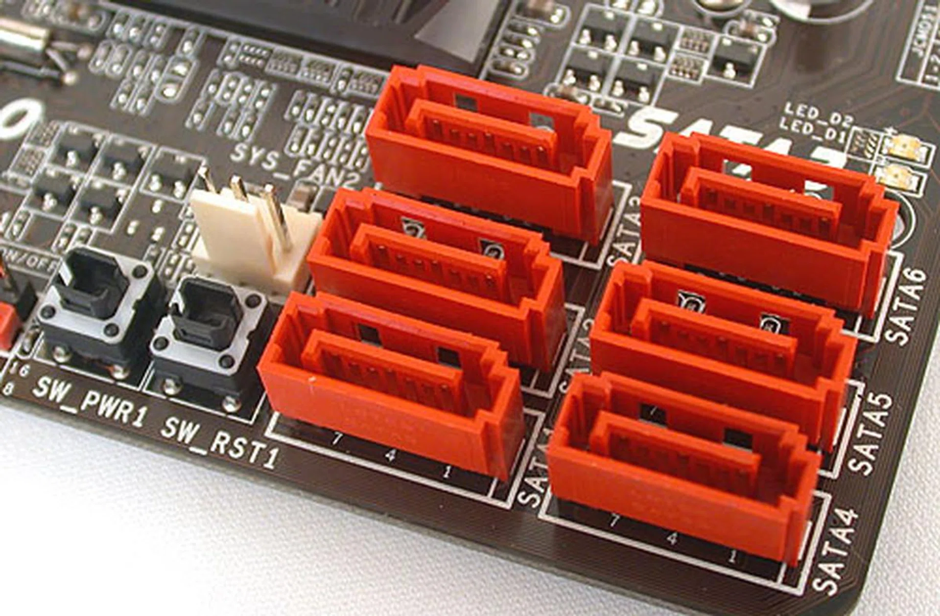 Surprisingly we found onboard power and reset buttons besides the six SATA 6Gbps ports. There's no eSATA option if you're hoping. 