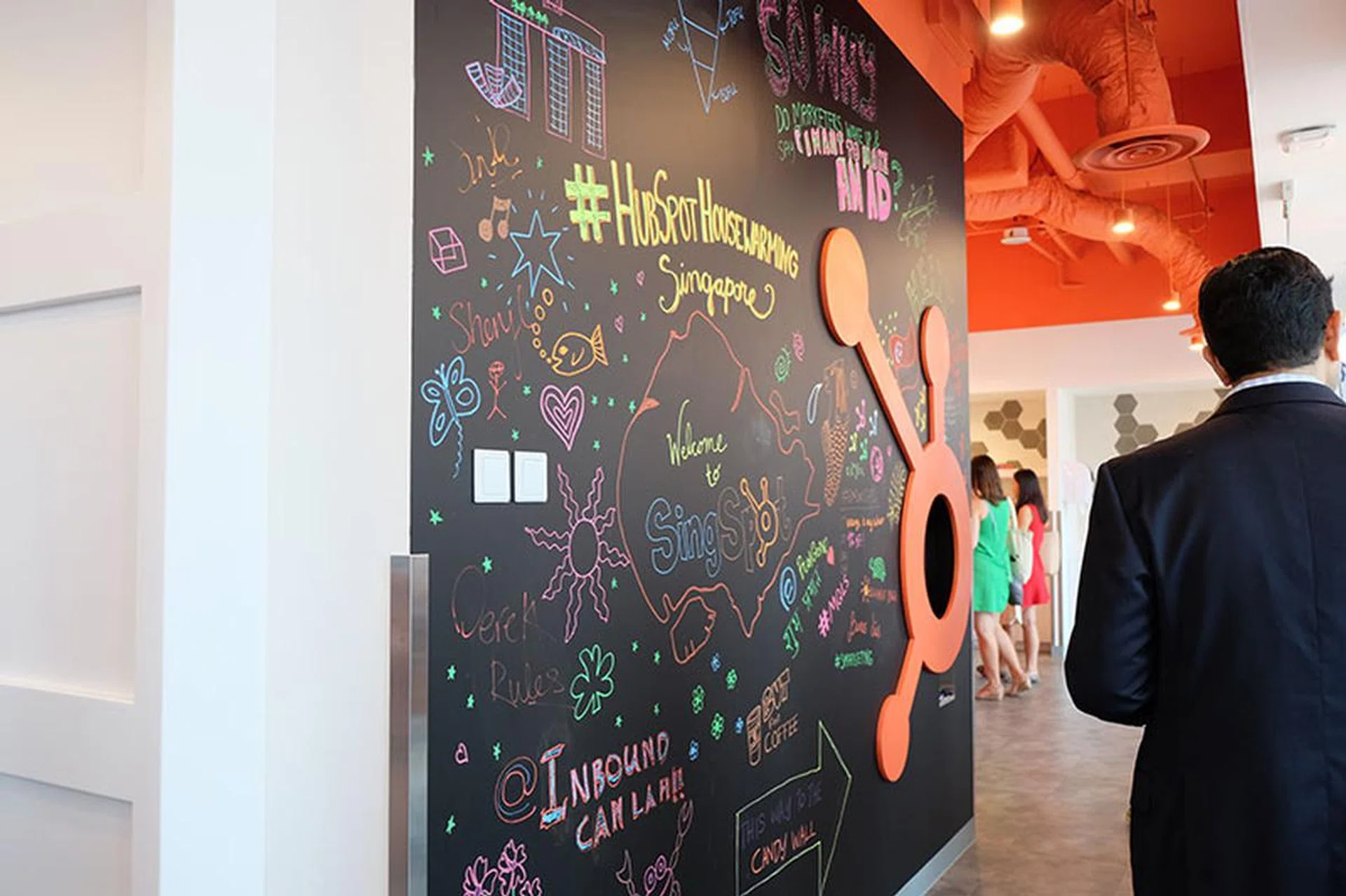 HubSpot employees put the finishing touches onto this wall themselves.