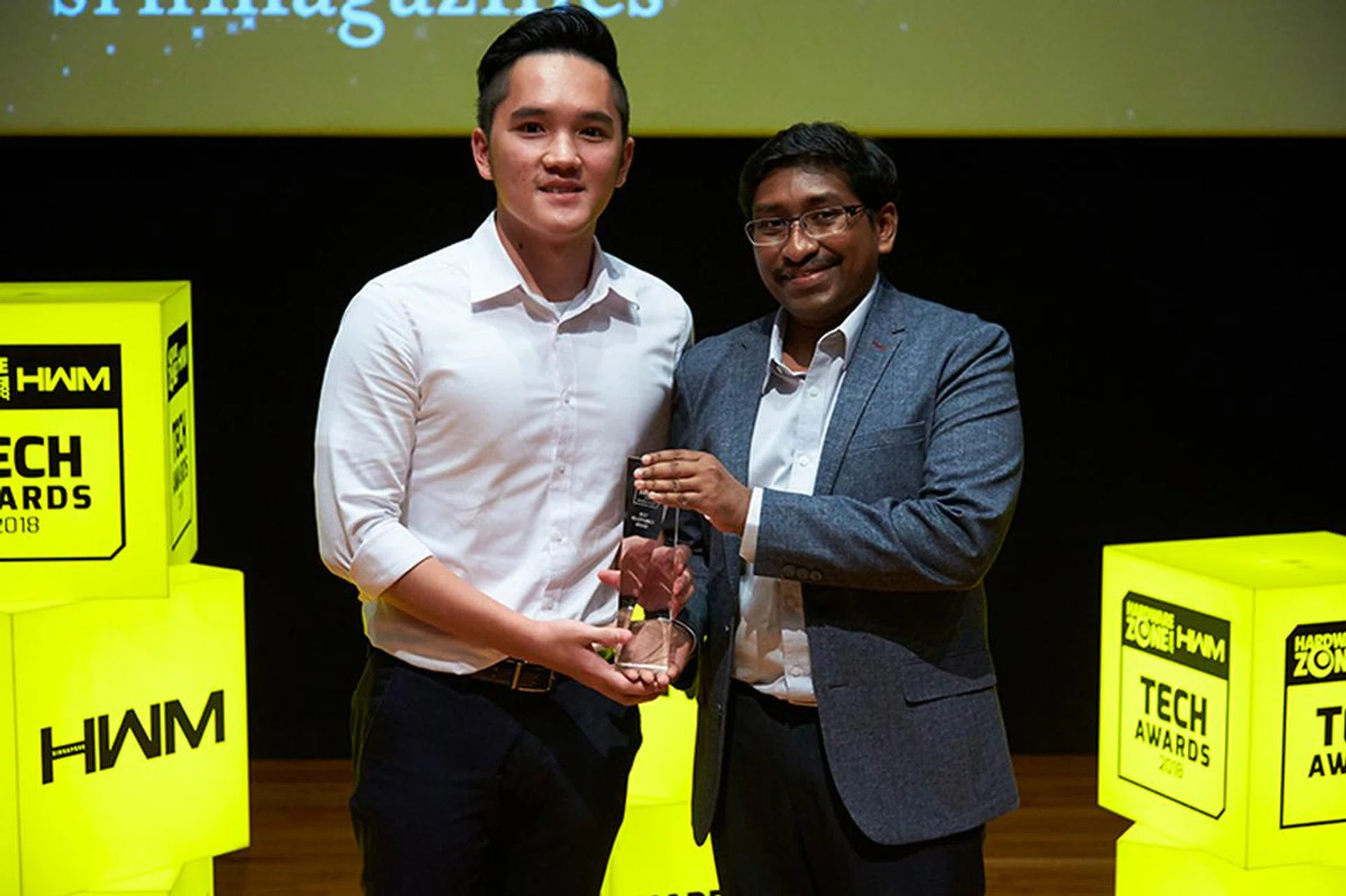 Bose is the Readers' Choice award winner for Best Headphones Brand and Best Home Theater Brand. Accepting the award here is Mr. Winston Seow, Marketing, Merchandising & Sales Coordinator from Bose.