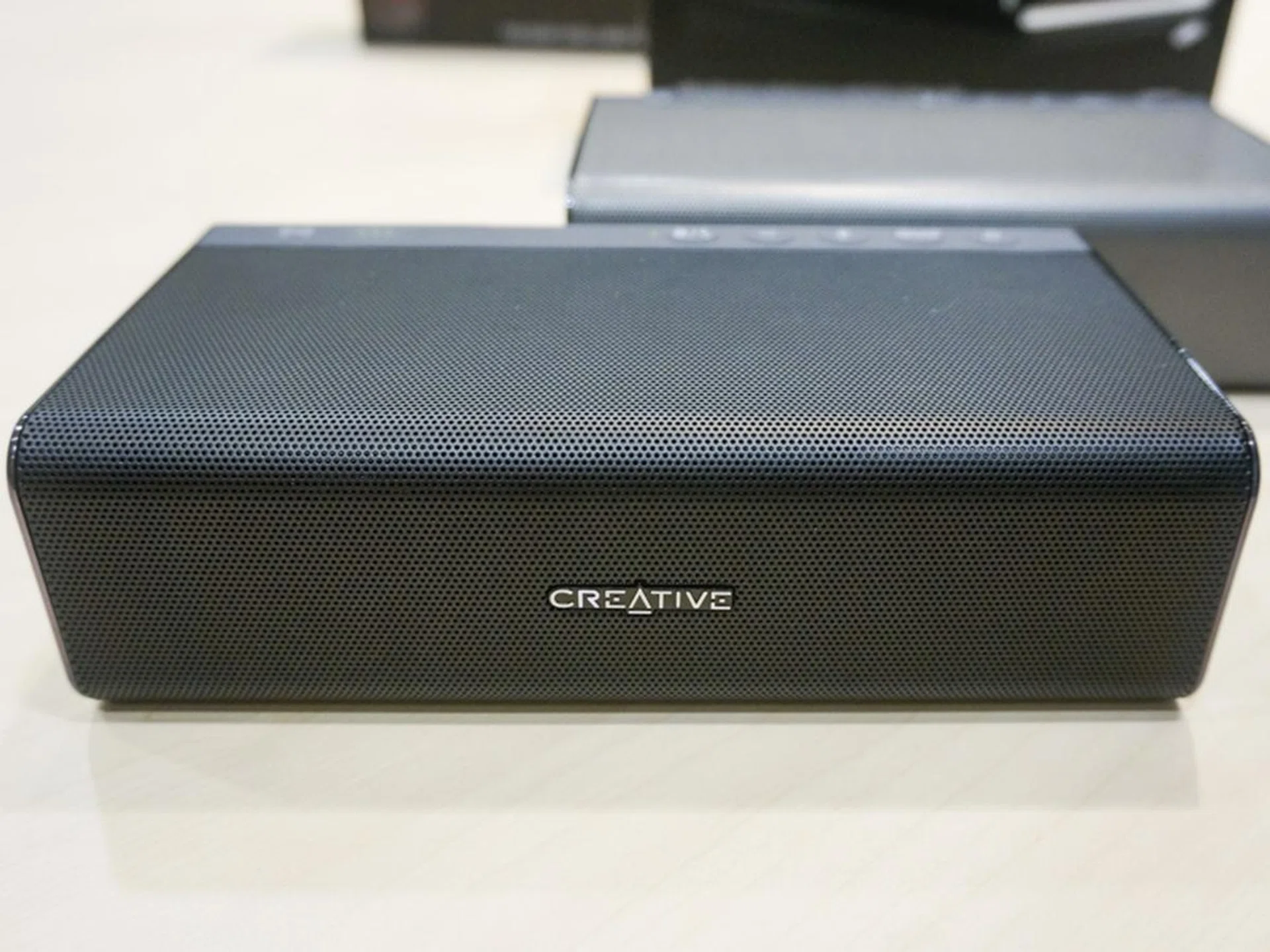 The new Roar Pro in front of a Classic Sound Blaster Roar .