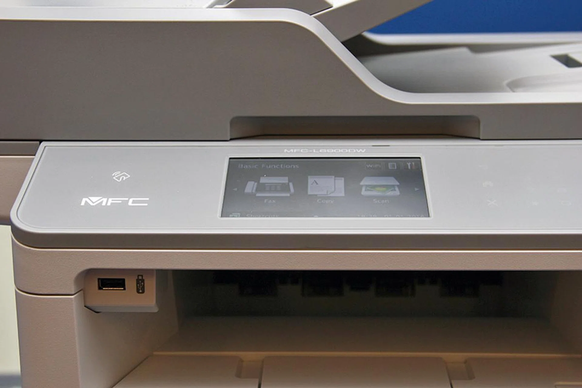 The MFC-L6900DW supports USB direct print and has an NFC card reader.