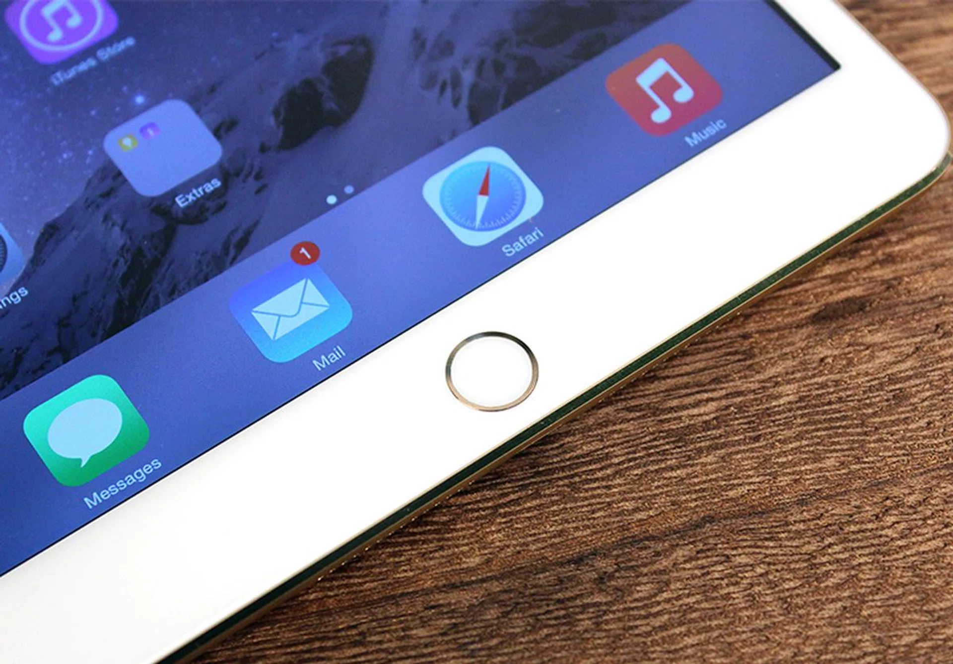 The only thing new about the iPad Mini 3 (apart from the new Gold finish) - the Touch ID sensor.