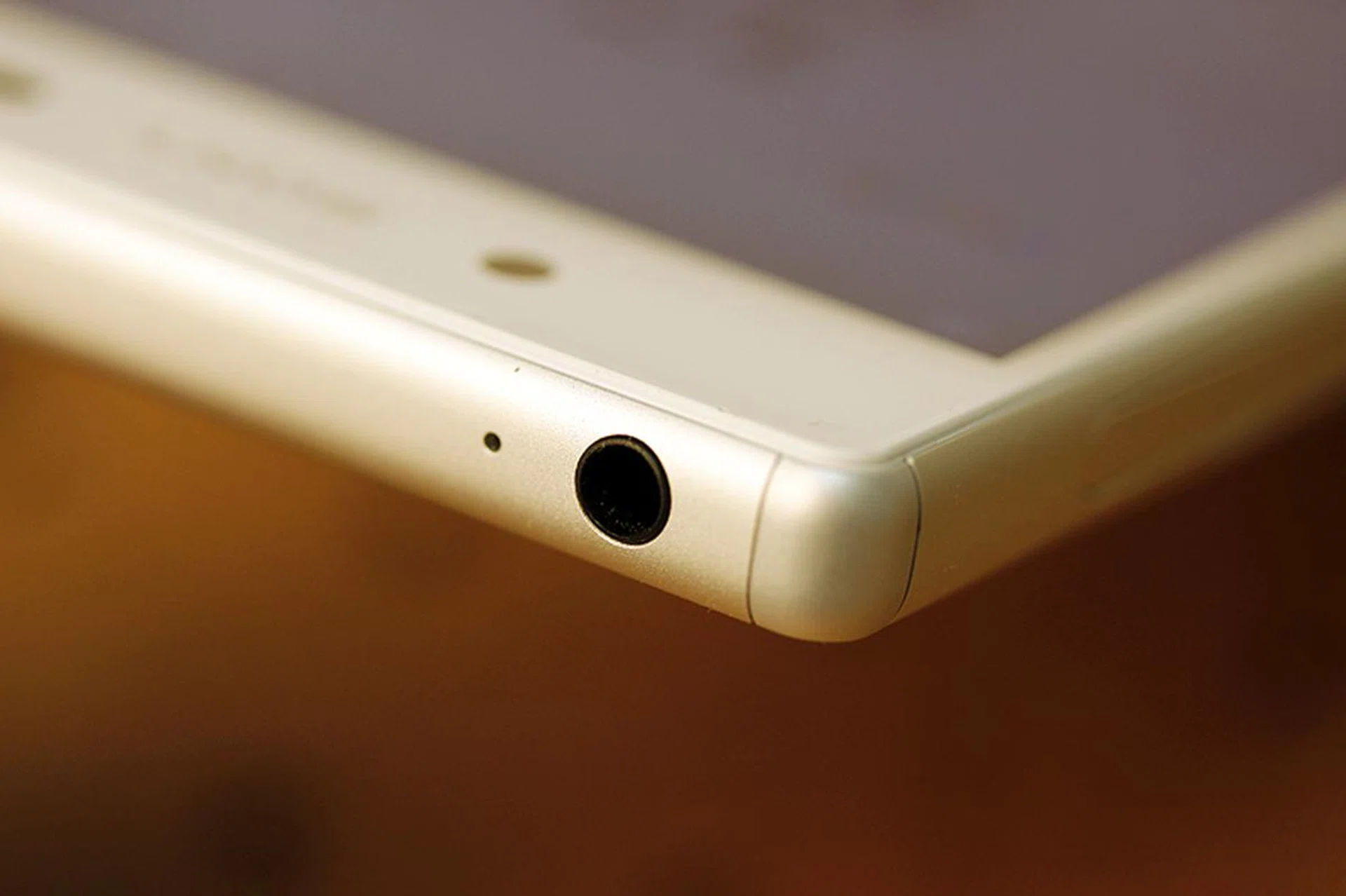 All three phones have the 3.5mm audio jack nested at the top left bunk of the phone (when it faces you).